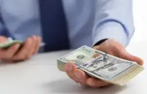 A man showing money