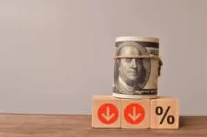 Money banknote, red arrow and percentage. Dollar rate decrease concept.