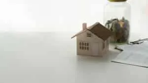 Investment properties money and home ownership model toy house o