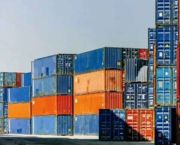 Floor Covering Weekly -Industry Overview & Key Trends Stacked shipping containers, blue and orange