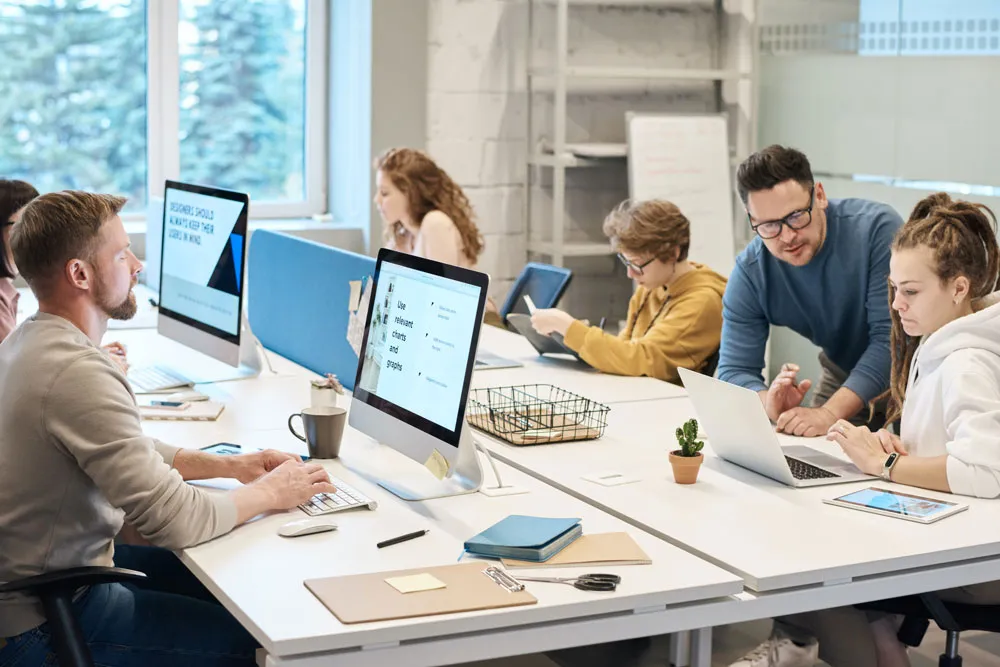 Adults working on computers