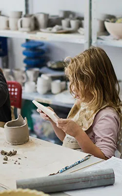 Girl doing pottery