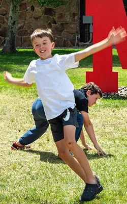 Boy using a microscope