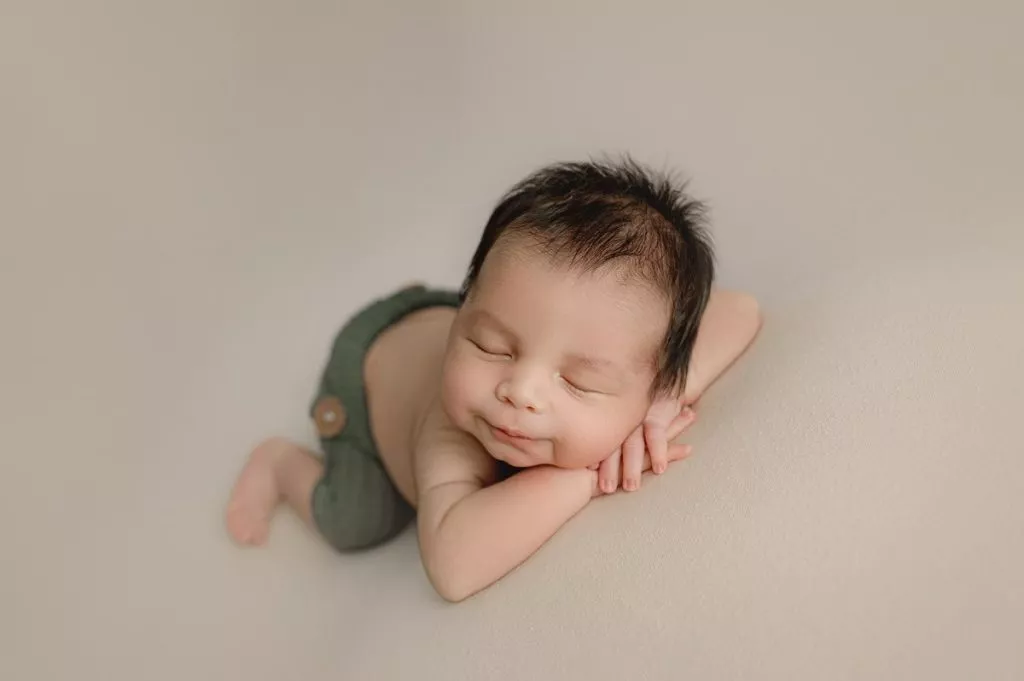 Newborn Baby Boy Wearing Green Pants