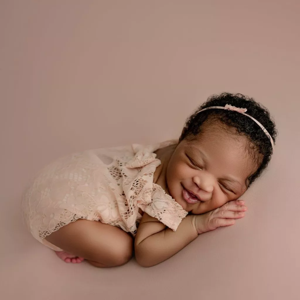 Vancouver Newborn Photography baby girl smiling