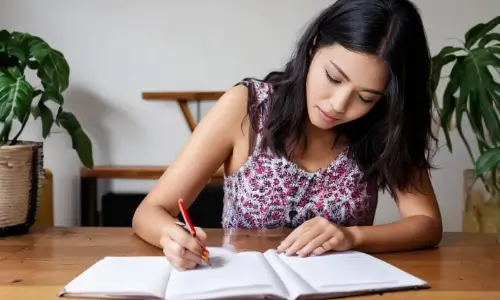 Woman Writing Clearly