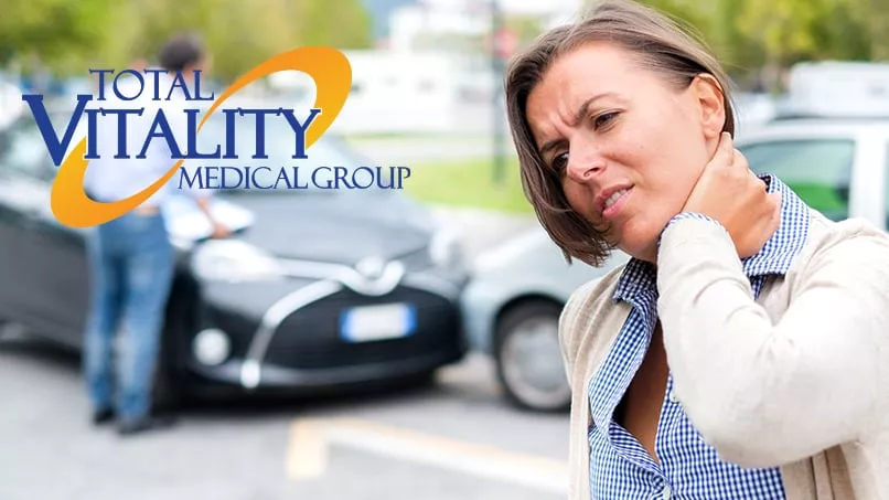 car-accident-doctor Injured driver holding neck after a car accident – Total Vitality Medical Group
