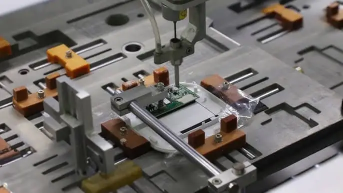 High-precision medical device manufacturing process with automated assembly equipment.