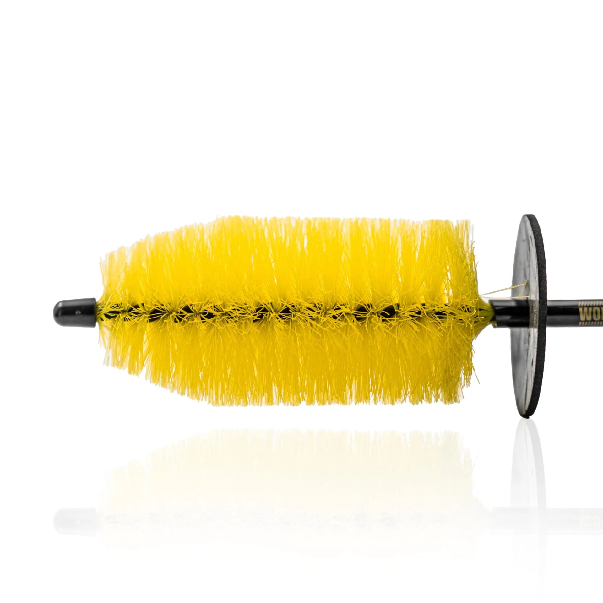 Yellow cylindrical cleaning brush with black handle and round black guard, bristles visible, on a white background.