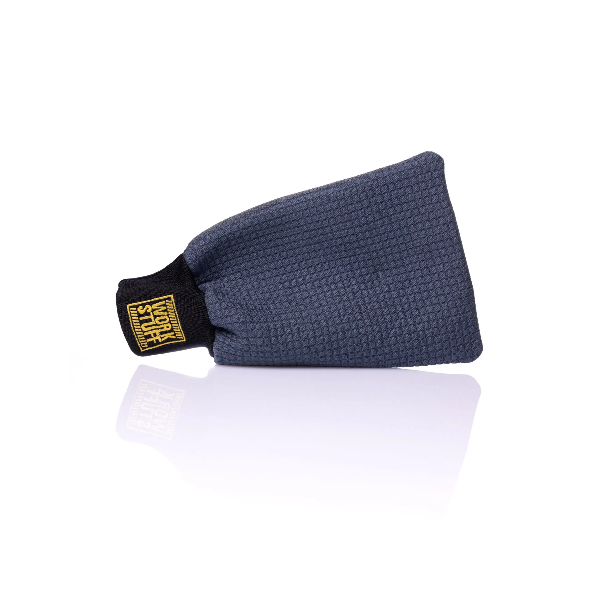 Textured dark gray waterless wash mitt with black cuff and yellow Work Stuff label on white background, slight reflection below.