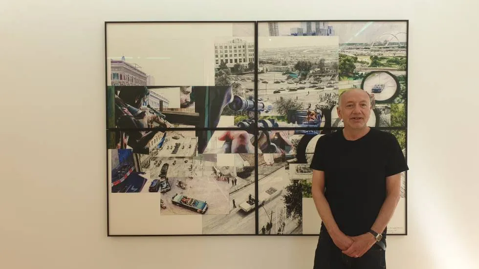 Alain Josseau devant "L'assassinat de JFK" / Photo 7 Jours à Clermont