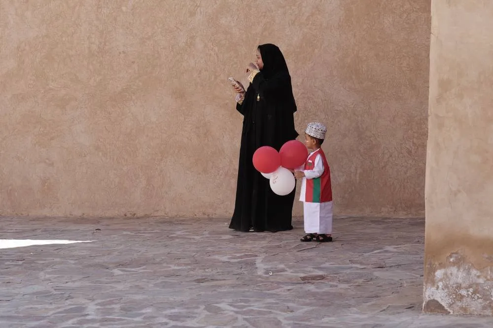 Oman, une femme et son enfant Photo Eric Gauthey