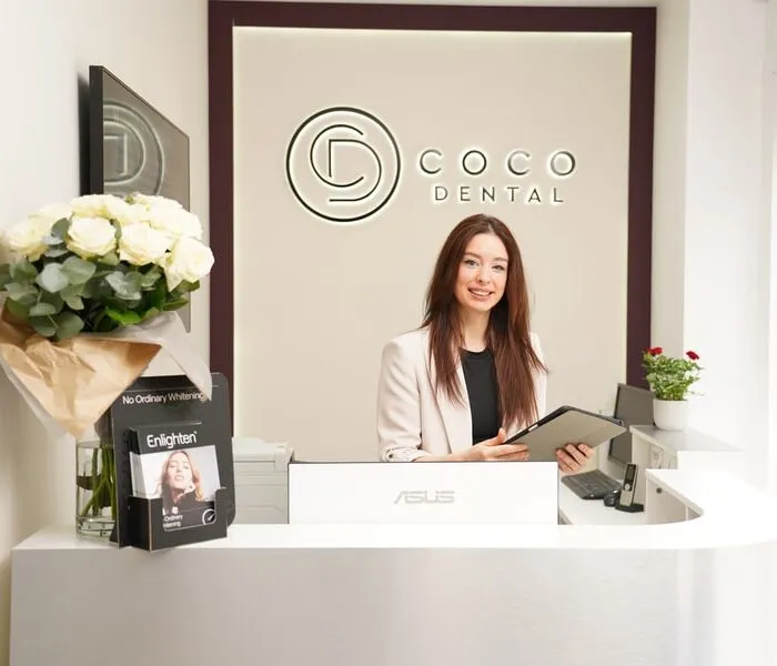 Homepage 7 cocodental dentist examining teeth during routine checkup image