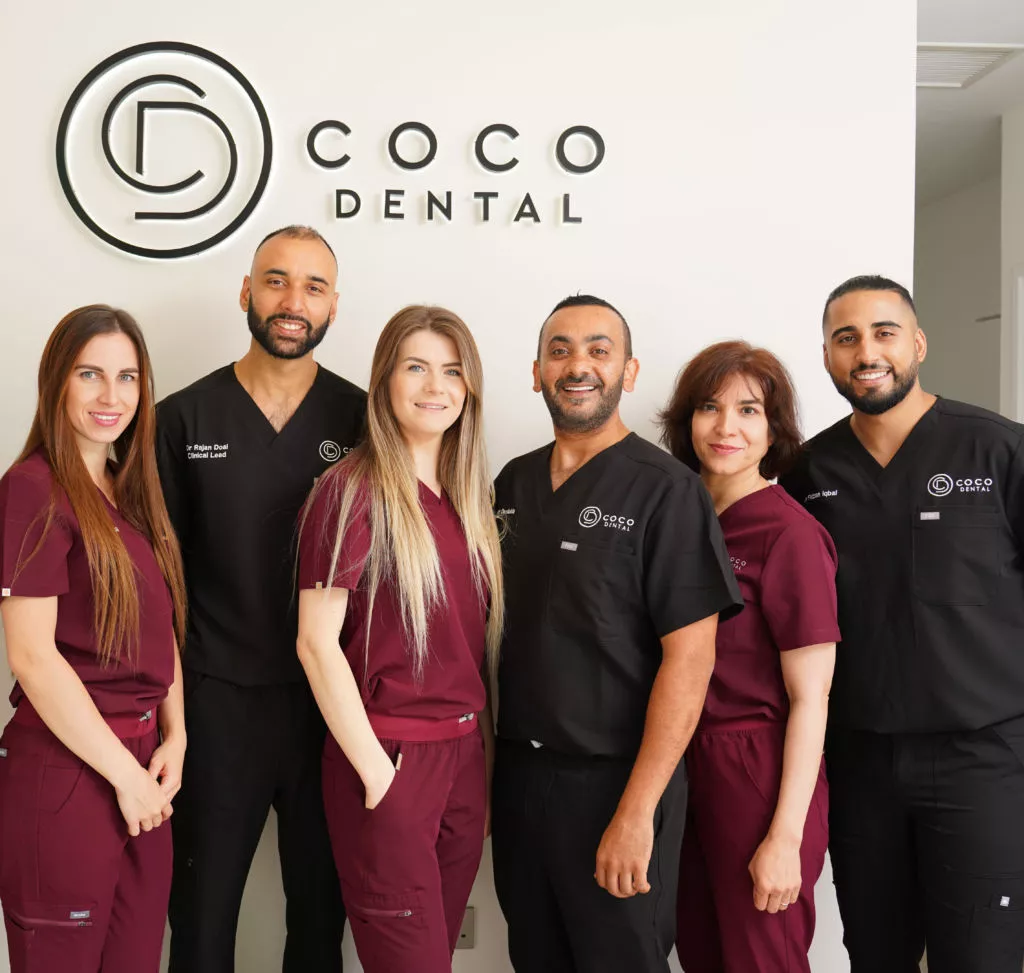 Homepage 10 cocodental dentist examining teeth during routine checkup COCO Dental 07452 copy e1743428919733 cocodental modern dental clinic providing professional care in uk