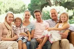 Three Generation Family Sitting on Sofa Together - Virginia Family Law Blog