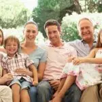 Three Generation Family Sitting on Sofa Together - Virginia Family Law Blog