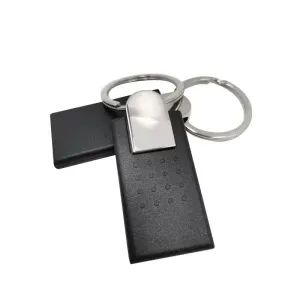 A close-up of a silver metal keyring with an rfid keychain tag (3) in black and rectangular shape attached.