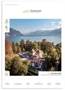 GuestLee brochure cover with aerial view of luxury Swiss villa by lake and mountains, promoting exclusive rentals in Switzerland. | GuestLee luxury rental Switzerland