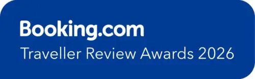 booking.com-traveller-review-award White text announces Traveller Review Awards 2026 on blue, showcasing GuestLee luxury rentals in Geneva, Verbier & Swiss Alps. | GuestLee luxury rental Switzerland