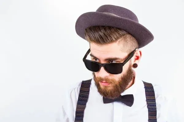 How Long After A Hair Transplant Can I Wear a Hat? how long after a hair transplant can i wear a hat - man wearing hat