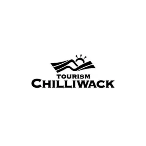 Tourism Chilliwack logo featuring stylized mountains, a sun, and the words "Tourism Chilliwack" in bold black text—perfect for promoting vacation rental management at beautiful Cultus Lake.