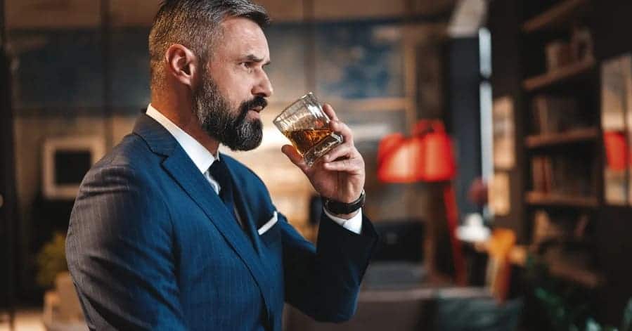 man drink malt whiskey