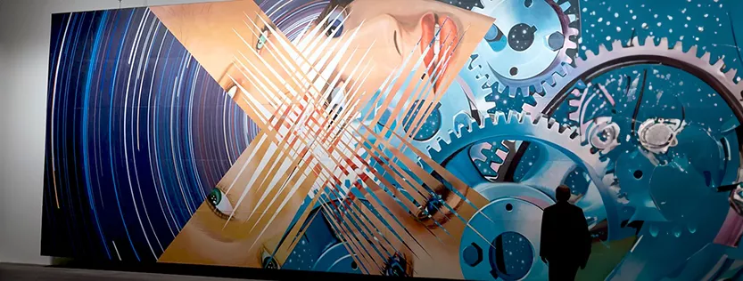 Large graphic art wall mural with a man in shadow standing in the foreground.