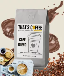 A bag of That's Coffee Cafe Blend, featuring brazil coffee beans, surrounded by chocolate splashes and breakfast items on a table.