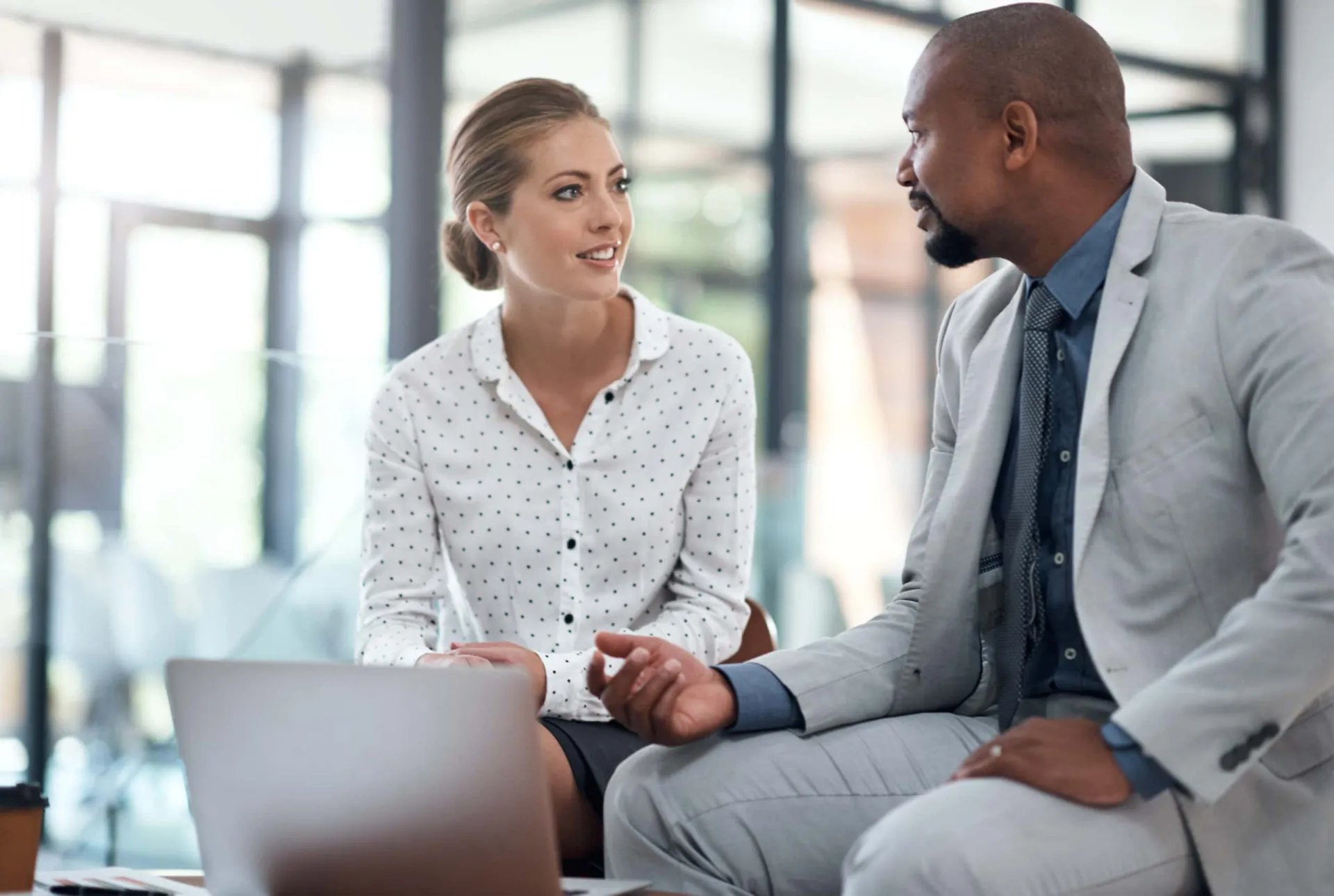 Effective B2B sales conversation strategies Business professionals engaging in a B2B sales call discussion.