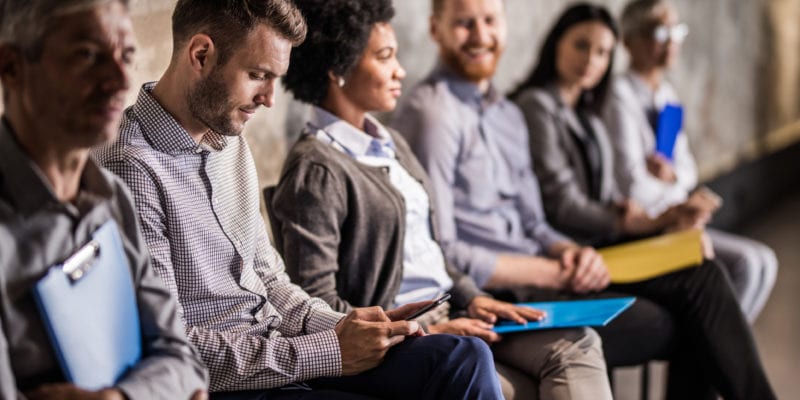 Business development professionals attending a training session.