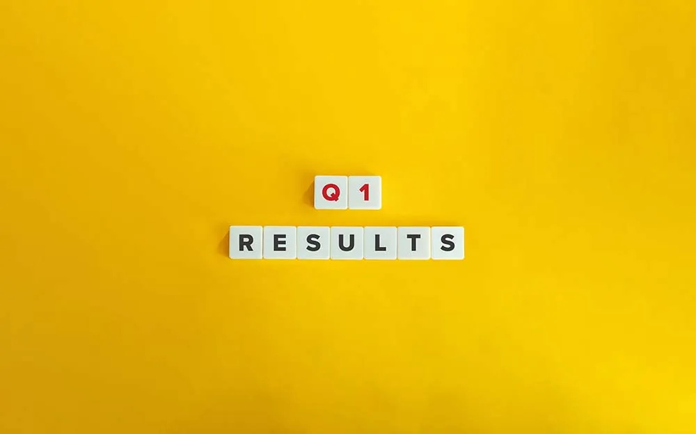 Yellow image with overlay text Q1 results with a focus on 5 Ways to Reassess Your Lead Generation Goals Mid-Q1