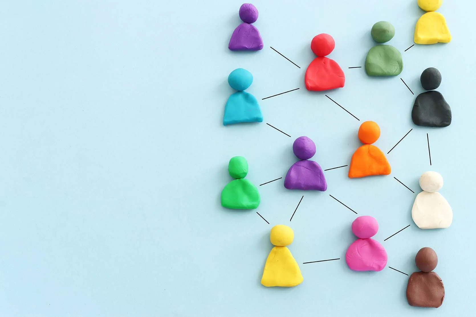 Connecting People for B2B Lead Generation and Human Connection. Multi colored people icons connected to show Human Connection and B2B Lead Generation