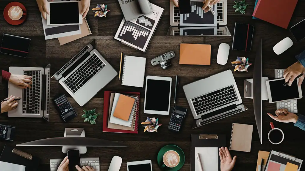 Effective Marketing Strategies for Business Growth Multiple devices showing how many marketing touchpoints are needed today