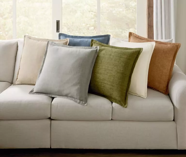 Fall color pillows on a couch