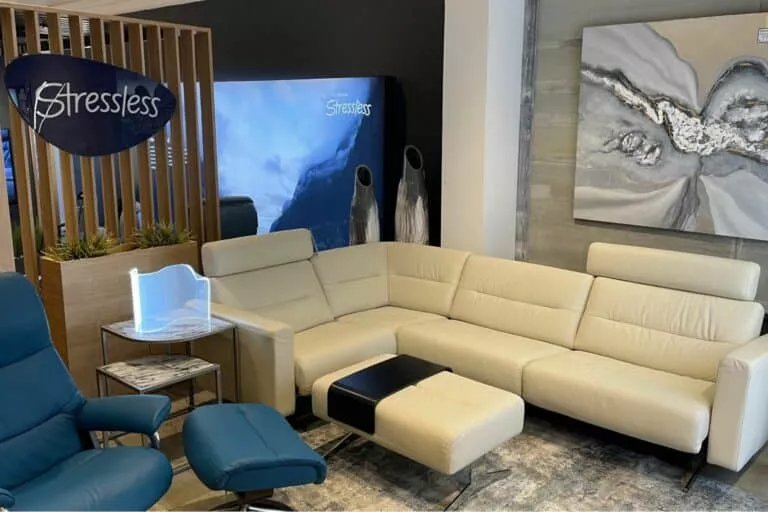 A Stressless sofa and other Stressless products in Woodchuck's Furniture showroom